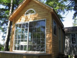 Front of cabin huge glass doors