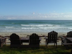 Beach in front of cottage at high tide